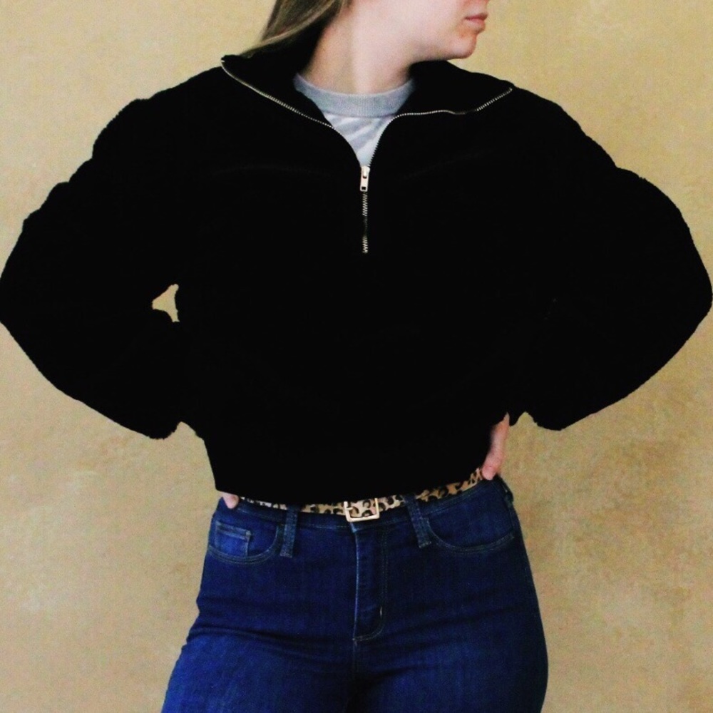 Black fuzzy jacket.